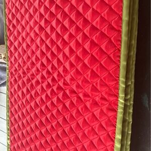 Seven beautiful red & green quilted satin placemats.